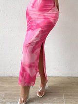Pink printed strapless side-slit maxi dress, skirt detail.