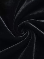 Black sweetheart-neck pleated long-sleeve mini dress, fabric close-up.