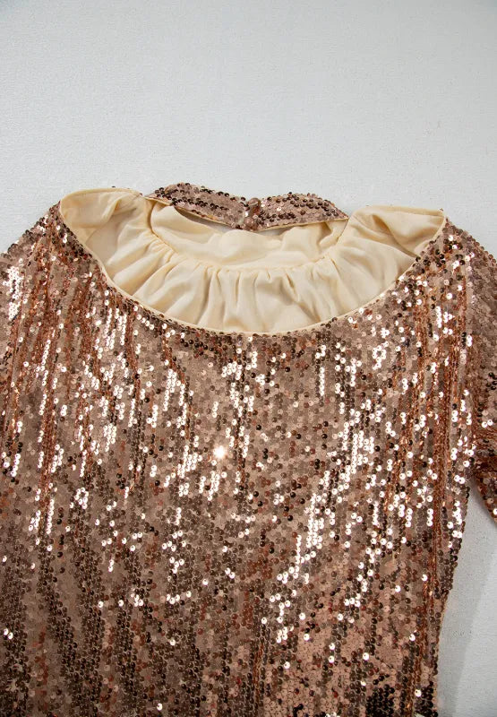 Gold-tone sequin dress lining detail