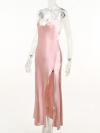Blush-pink cowl-neck dress with high slit on mannequin