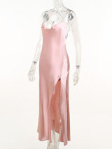 Blush-pink cowl-neck dress with high slit on mannequin