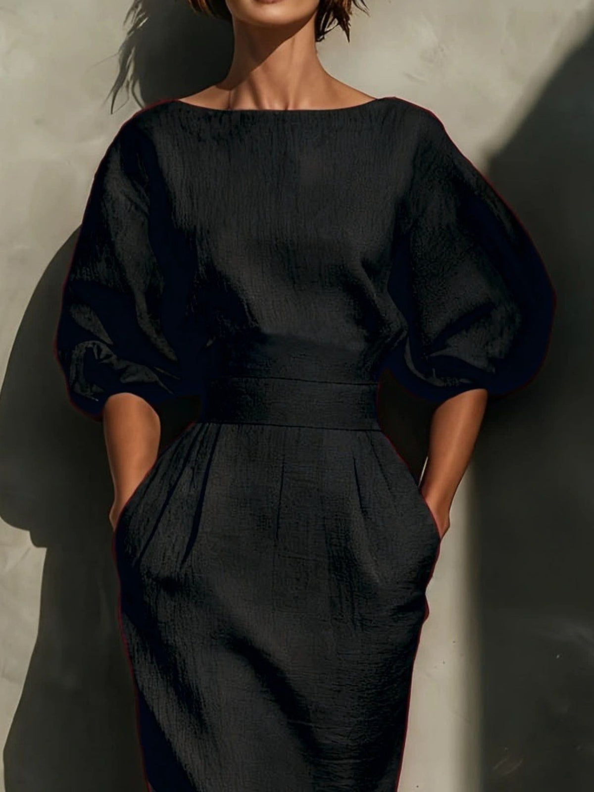 Black puff-sleeve midi dress, front bodice detail