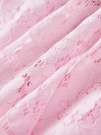 Pink short-sleeve lace mermaid midi dress, lace detail.