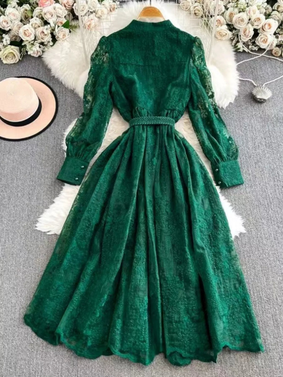 Green lace tie waist long sleeve dress, front view.