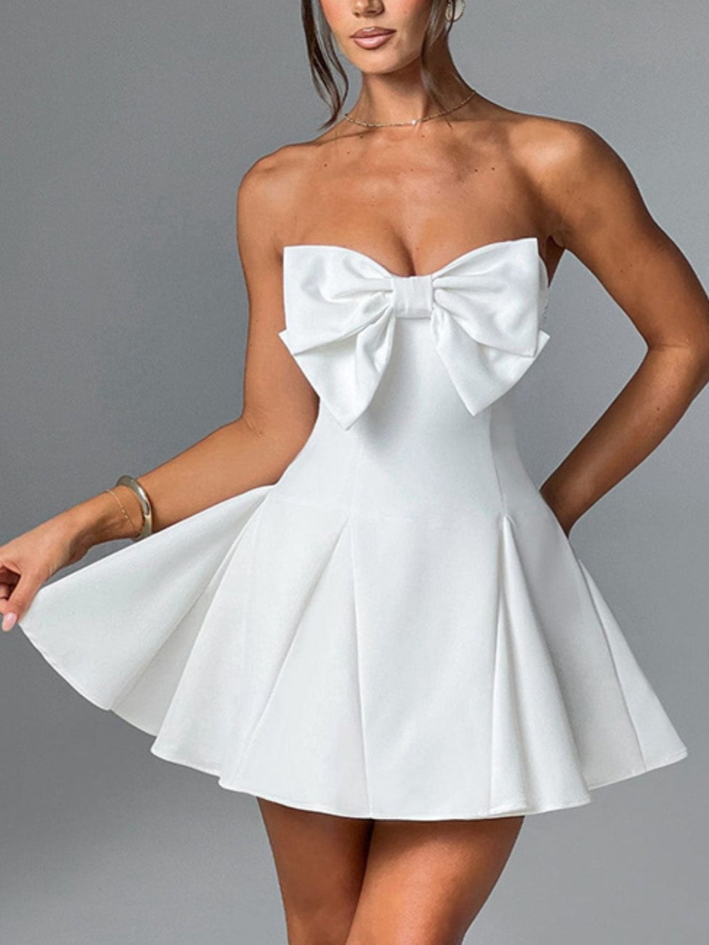 Bow-detail strapless mini dress side view