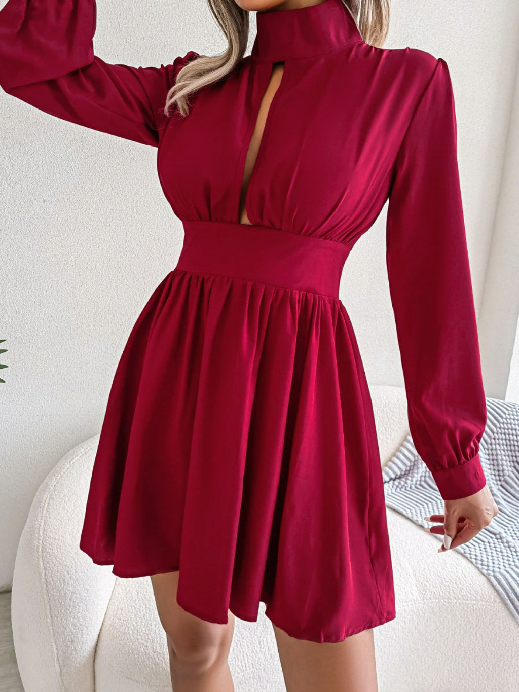 Long-sleeve A-line mini dress detail