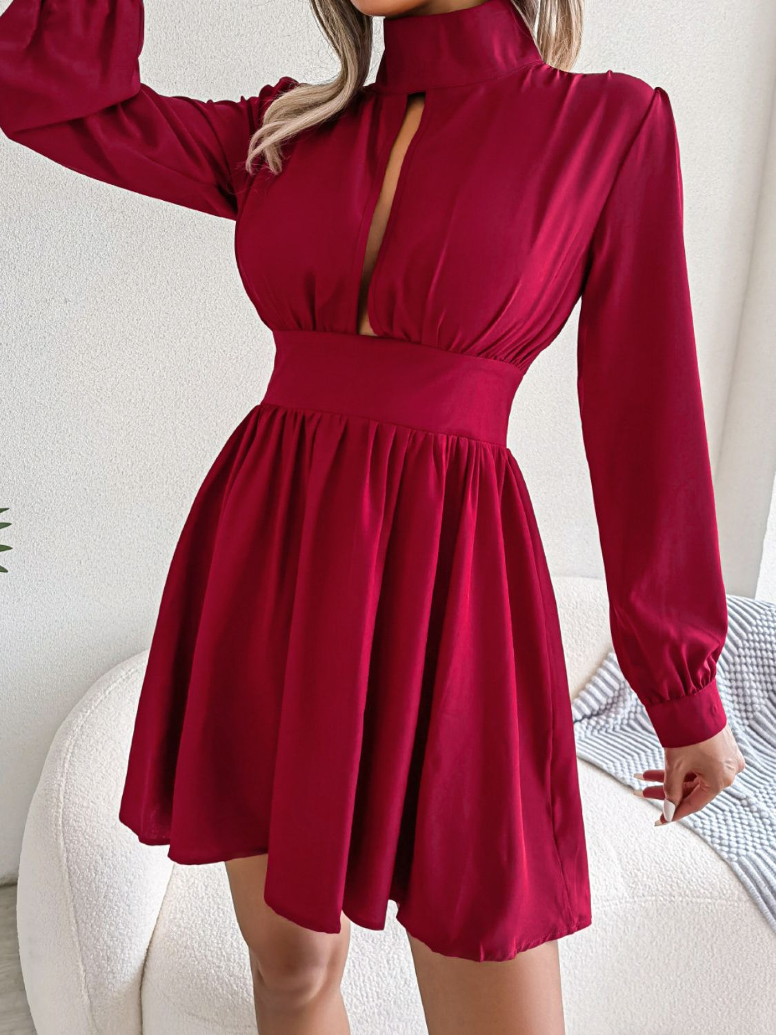 Long-sleeve A-line mini dress detail