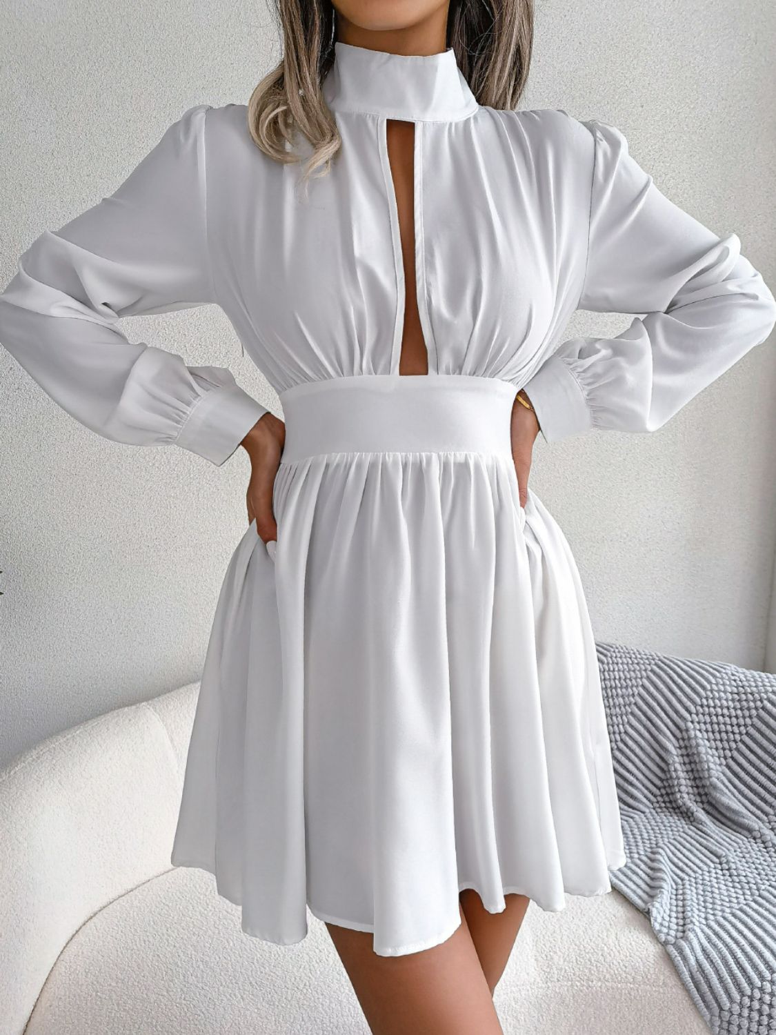 White long-sleeve cutout-neck mini dress, front view