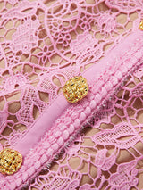 Pink lace button-up midi dress with pockets, button detail.