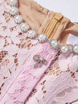 Pink short-sleeve lace mermaid midi dress, zipper detail.