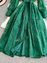 Green lace tie waist long sleeve dress, skirt detail.