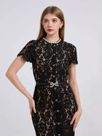Black short-sleeve lace mermaid midi dress, front view.