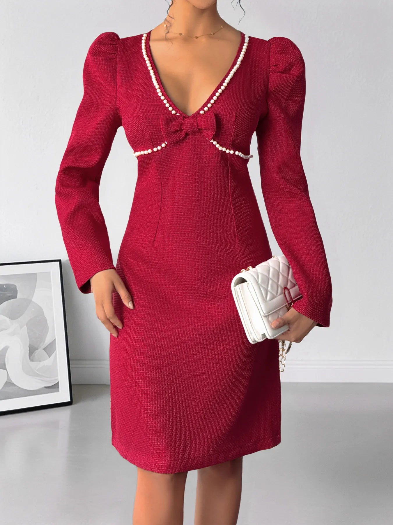 Red bodycon dress with bow detail