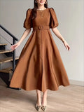 Tan belted puff-sleeve midi dress front view