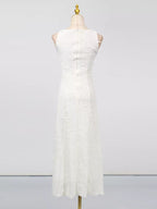 White sleeveless floral appliqué midi dress, back view.