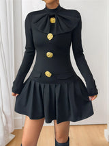 Black mock-neck long-sleeve mini dress, front view.