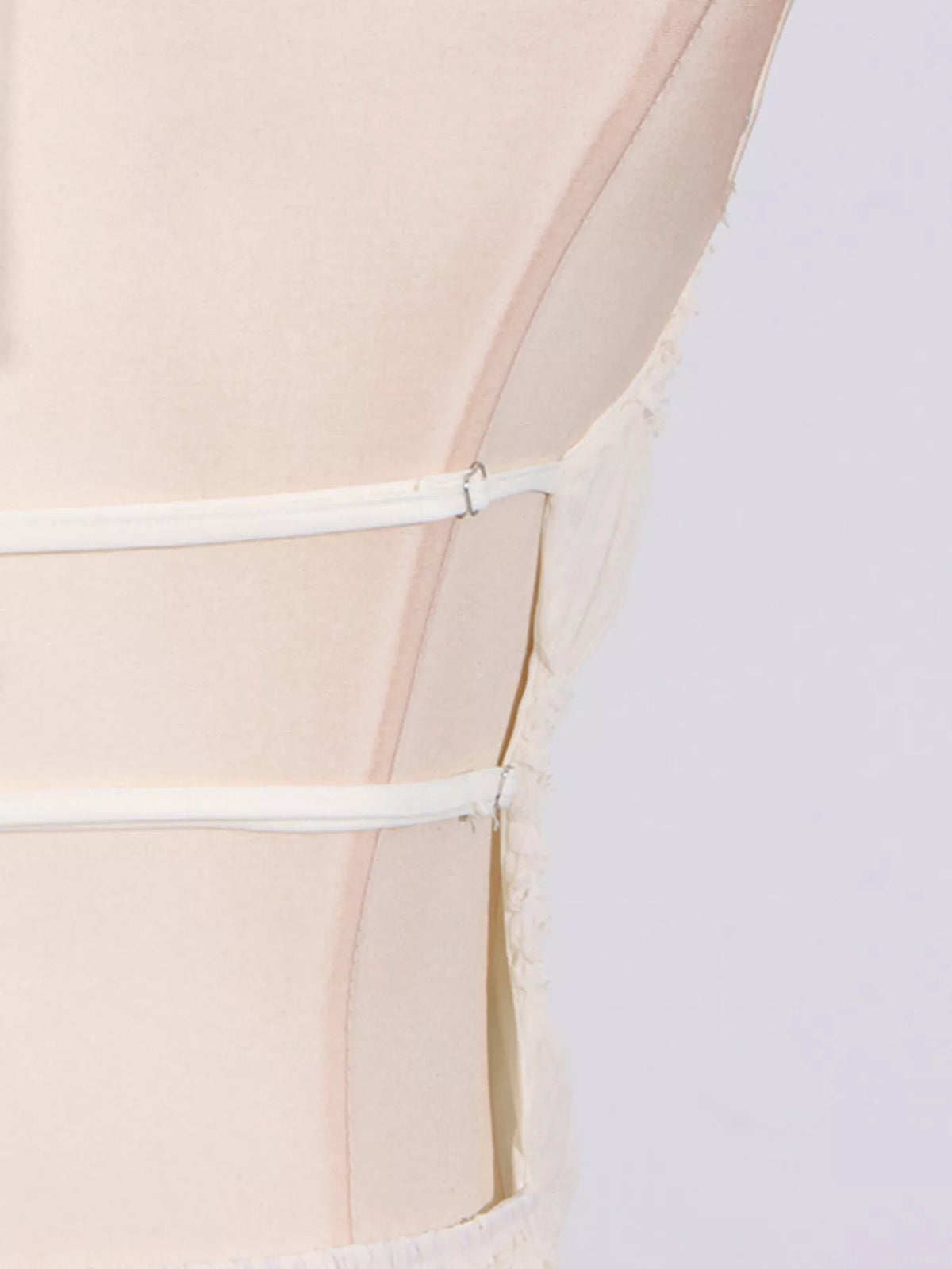 Ivory ruched halter neck maxi dress, back view.