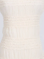 Ivory ruched halter neck maxi dress, skirt detail.