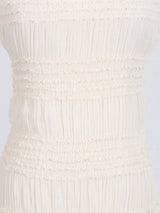 Ivory ruched halter neck maxi dress, skirt detail.