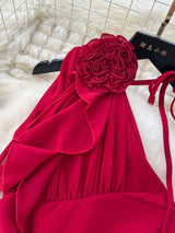 Red one-shoulder floral decor dress, shoulder detail.