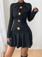 Black mock-neck long-sleeve mini dress, front view.