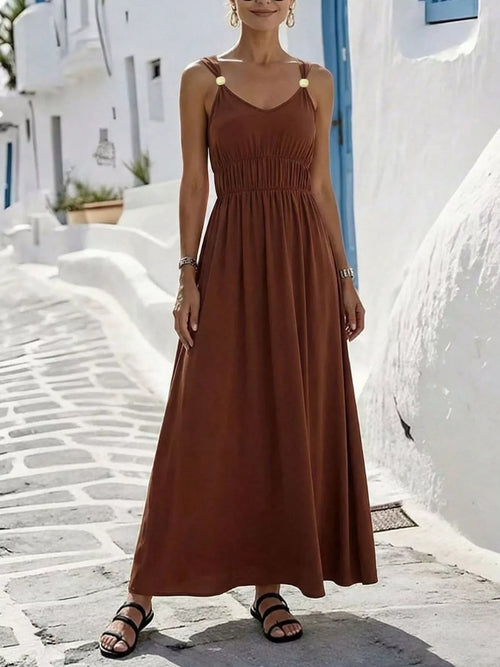 Brown ruched v-neck maxi dress, front view.