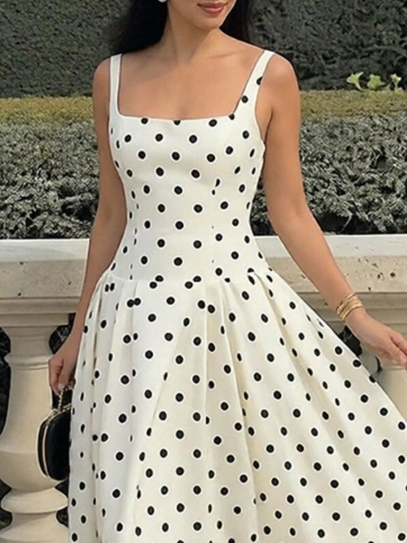 Cream polka-dot maxi dress side view