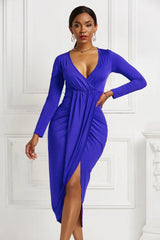 Royal blue ruched long-sleeve wrap dress, front view with asymmetric hem