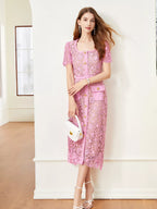 Pink lace button-up midi dress with pockets, front view.