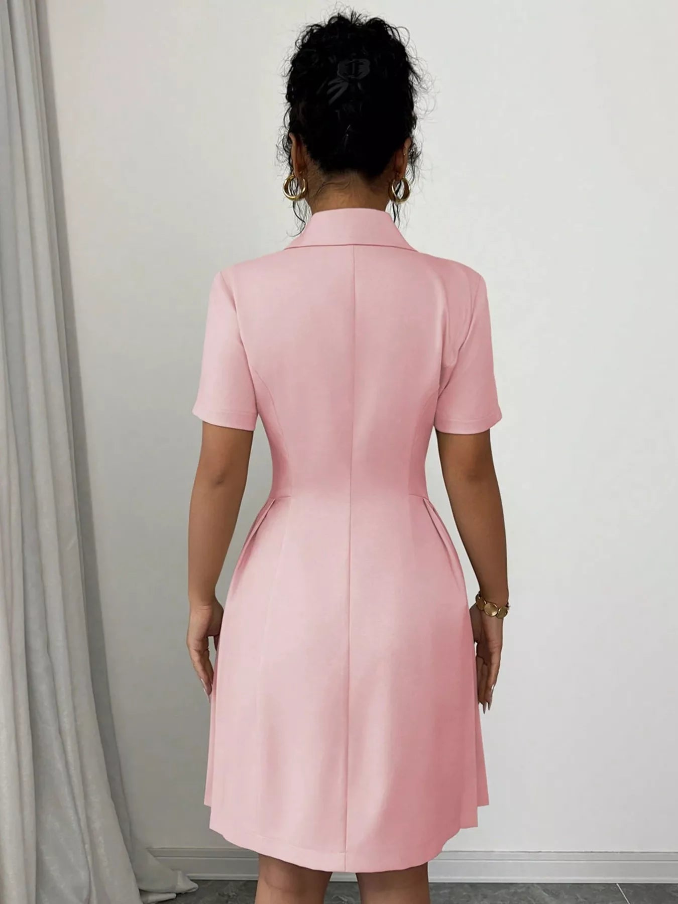 Tailored pleated blazer dress detail