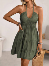 Olive green smocked halter tiered mini dress, front view