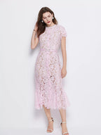 Pink short-sleeve lace mermaid midi dress, front view.