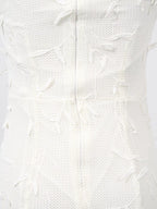White sleeveless floral appliqué midi dress, back view.