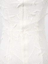 White sleeveless floral appliqué midi dress, back view.