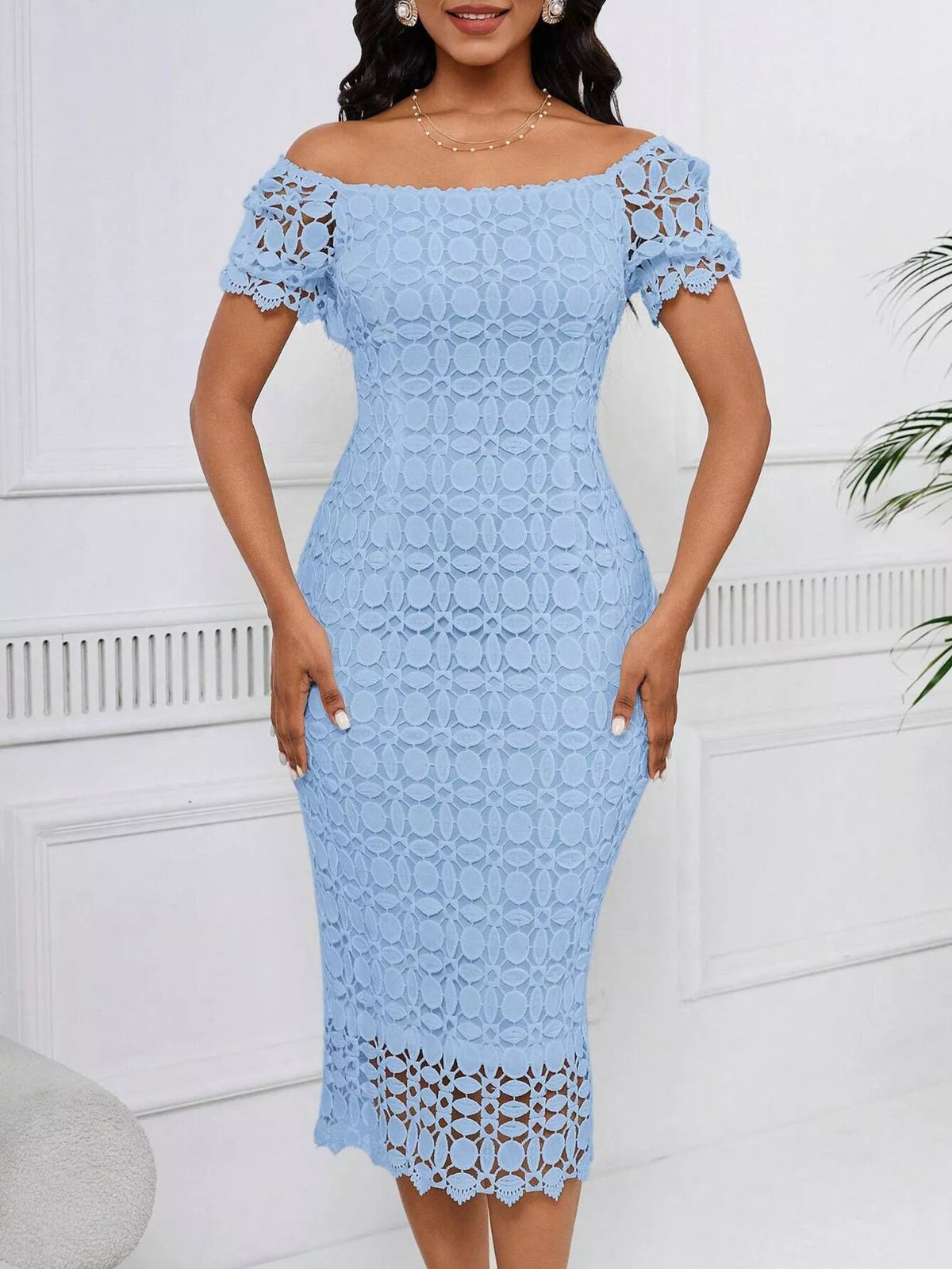 Light blue short-sleeve lace midi dress with slit, front view.