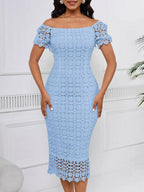 Light blue short-sleeve lace midi dress with slit, front view.