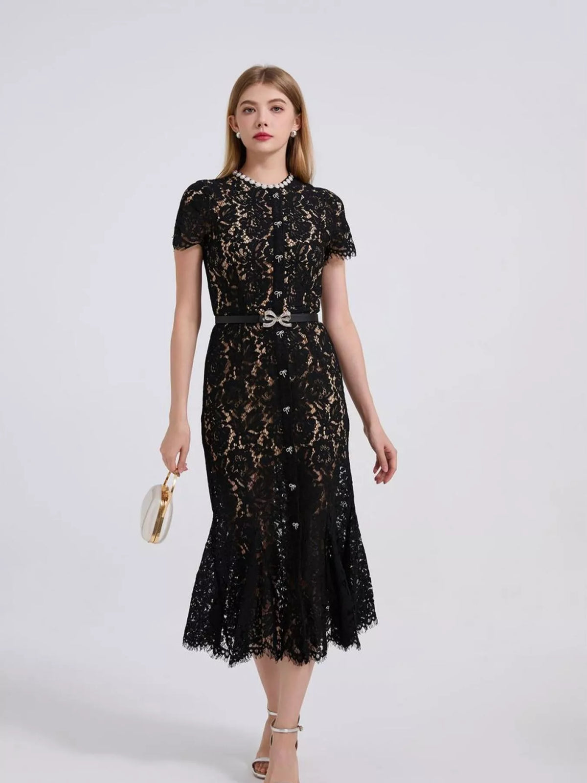 Black short-sleeve lace mermaid midi dress, front view.