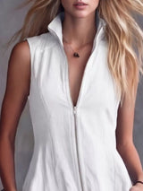 White plus-size high-low ruffled zip-front dress, neckline detail.