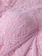 Pink lace long-sleeve midi dress, lace detail.