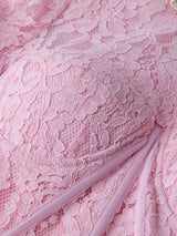 Pink lace long-sleeve midi dress, lace detail.