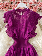 Purple ruffled mock-neck lace maxi dress, bodice detail.