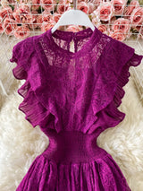 Purple ruffled mock-neck lace maxi dress, bodice detail.
