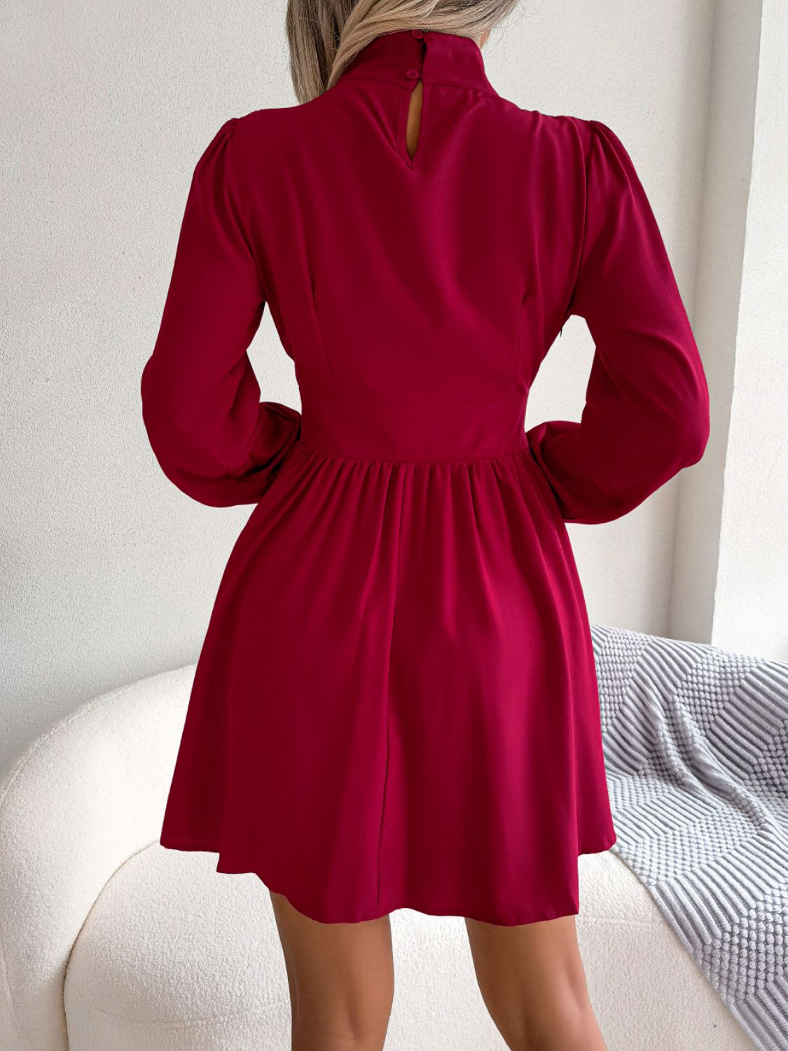 Black cutout turtleneck dress back view