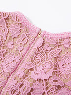Pink lace button-up midi dress with pockets, back neckline detail.