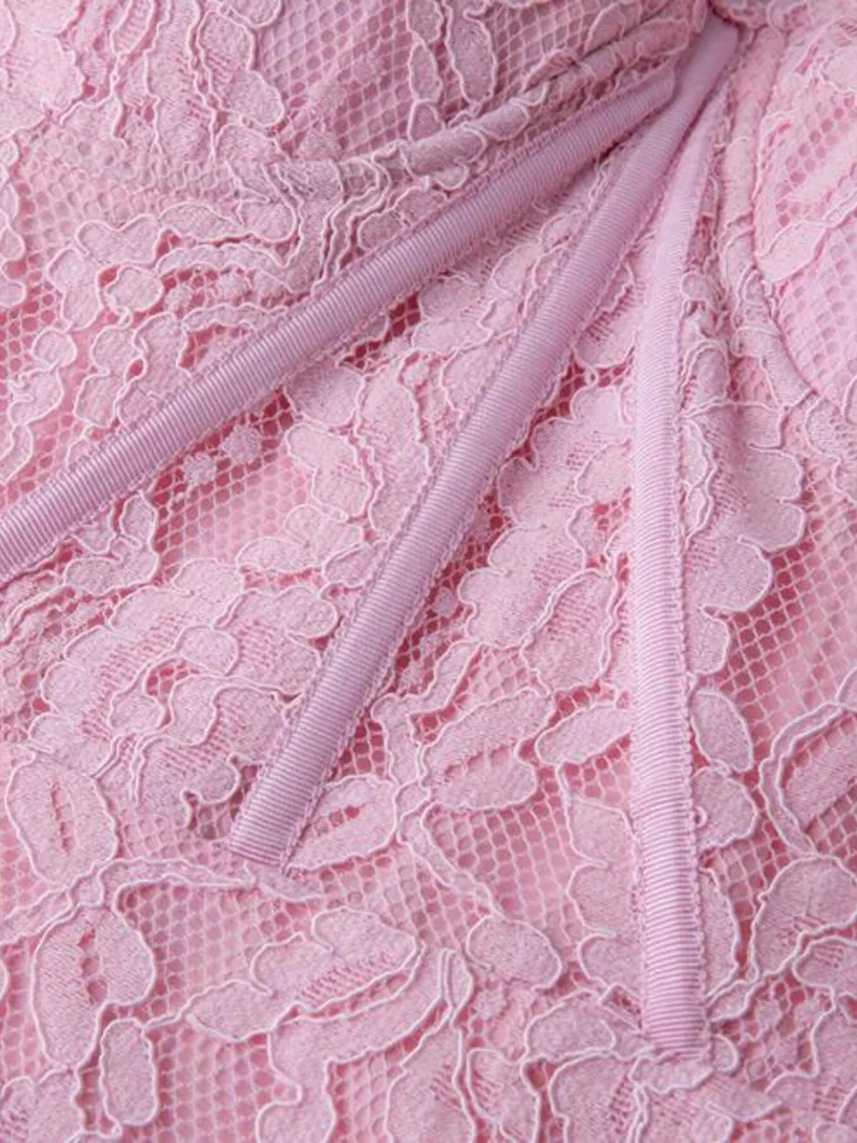 Pink lace long-sleeve midi dress, sleeve detail.