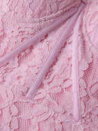 Pink lace long-sleeve midi dress, sleeve detail.