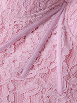 Pink lace long-sleeve midi dress, sleeve detail.