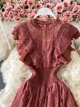 Rust ruffled mock-neck lace maxi dress, bodice detail.