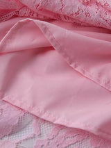Pink lace long-sleeve midi dress, lining detail.