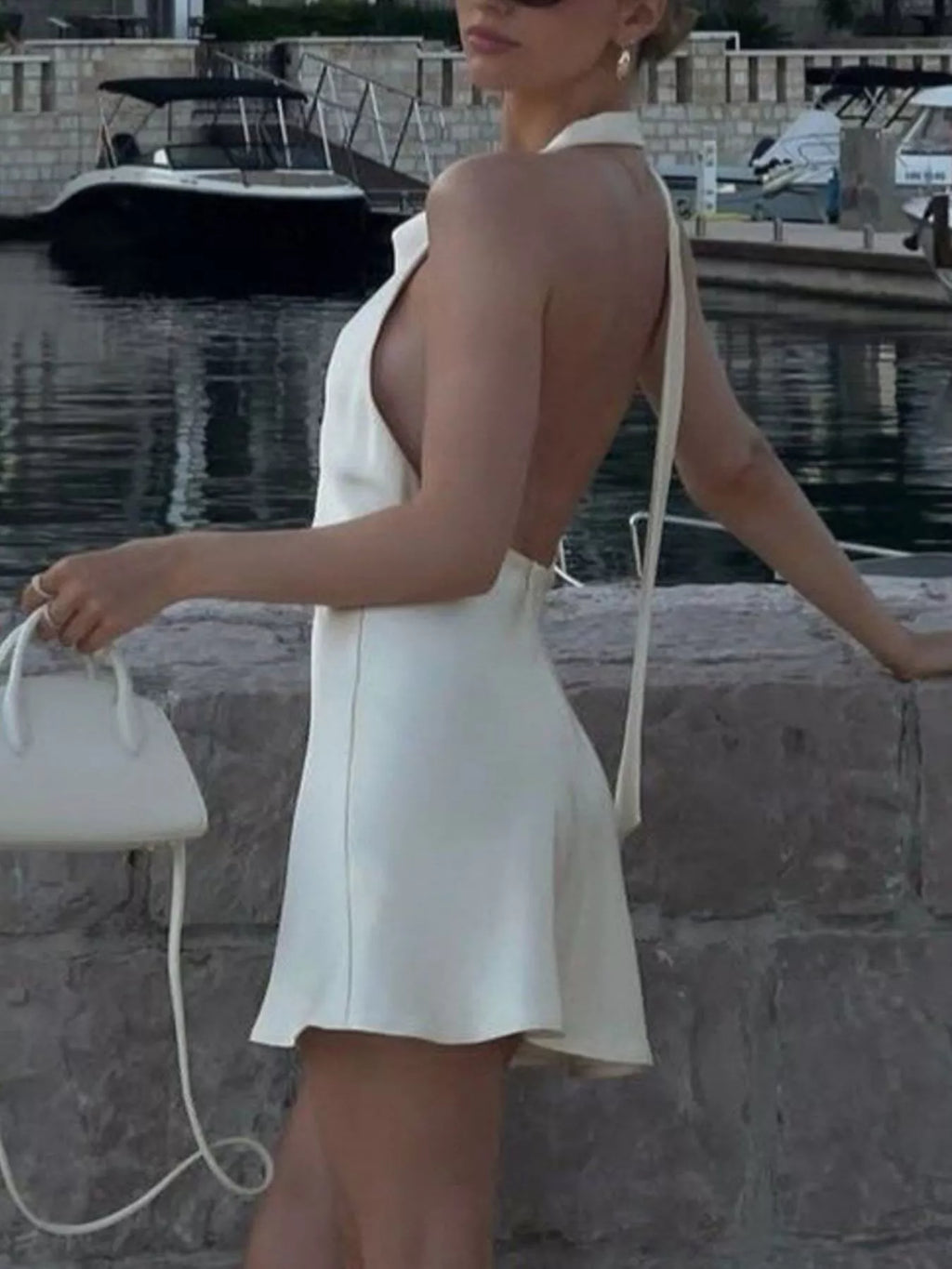 Halter-neck mini dress side view